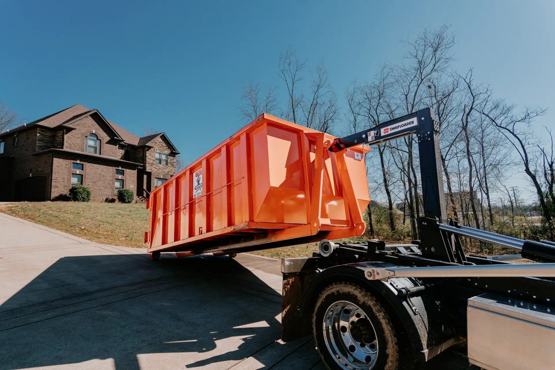 Residential roll-off dumpster delivery