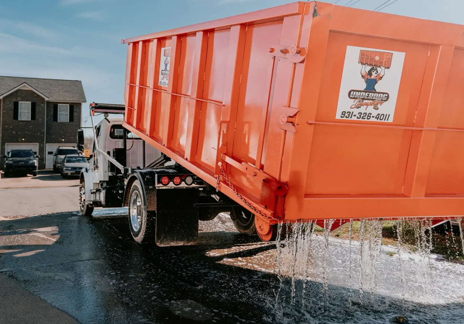 Commercial roll-off dumpster delivery for a business project